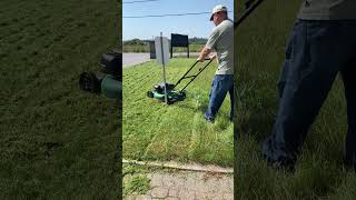 Cutting lawn on this beautiful hot day!