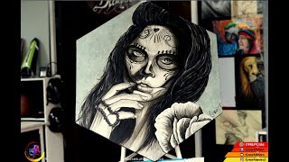 Dibujo y pintura de  una Catrina con pinceles.