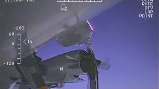 Russian Su 27 Flanker intercepting U S  EP 3 Aries II intelligence gathering aircraft flying over th