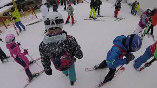 Amanda Adrain skis to blue restaurant inside, rauris jan '20. Austria.