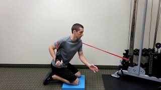 Tall Kneeling Vertical Bridge with Resistance: Left Rotation