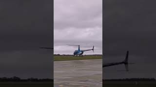 Robinson R44 reverse landing at Norwich Airport