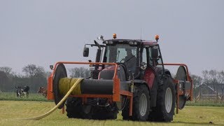 Sleepslang oprollen op een haspel.