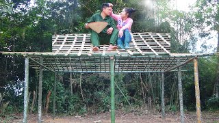 Roofing the bamboo house with palm leaves, meager meals - Young couple building a new life