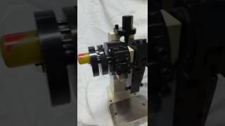 Toggle press with return locking mechanism