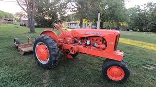 1950 Allis Chalmers WD doing some field mowing