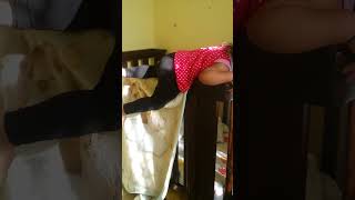 Baby Tripat Climbing out of her Crib