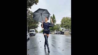 umbrella fashion/fabulous ladies wearing knee boots outfit with black above knee mini dress #outfit