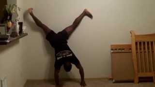 One arm handstand pushup negatives