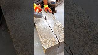 Split thick granite block using only a hammer and chisel, true skill for outdoor granite designs