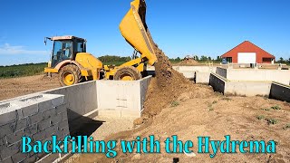 Backfilling Porches With The 912 Hydrema