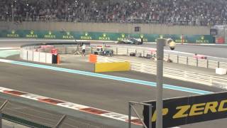 Lewis Hamilton celebration burnout wheel spin and Union Jack flag F1 Abu Dhabi Grand Prix 2014