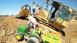 Playing in the dirt with a Bulldozer and kids tractors | Tractors for kids