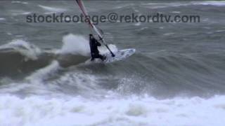 Windsurfer riding Wave in Winterstorm