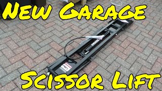 Unboxing of portable car scissor lift