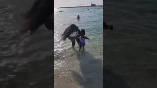 Teaching my daughter how to swim at the beach ⛱️