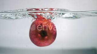 Apple Dropping in Water | Stock Footage - Envato elements