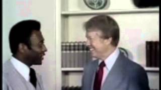 March 28, 1977 - Pele gives a soccer ball to President Jimmy Carter during a White House visit