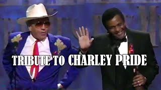 TRIBUTE TO CHARLEY PRIDE. BUCK OWENS presents the award.