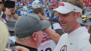 Kentucky HC Mark Stoops handshake with OLE Miss HC Lane Kiffin after 'CATS upset No. 5 Rebels, 20-17