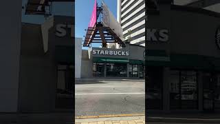 Pair of shoes over Starbucks in LA