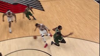 Damian Lillard causes John Henson to go FLYING with Behind the Back Crossover