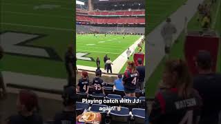 J.J. Watt having a catch with the fans pregame