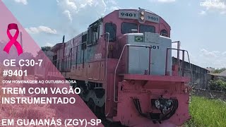 Trem com locomotiva GE C30-7 #9401 com vagão instrumentado passando por Guaianás (ZGY)-SP