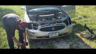 2005 - 2007 Buick Lacrosse "header panel" headlight mounting assembly removal and replacement.