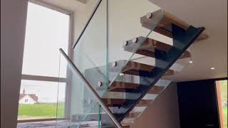 Frameless Balustrade with Handrails - Floating Stairs. Designed & installed by Balcony Installations