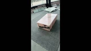 Pink onyx plinth coffee table