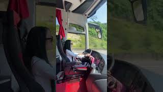 Female Bus Driver in tie