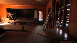 Abandoned Teddy Bear in a Farmers' Association's Deserted Assembly Hall.