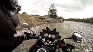 Hard offroading the V-Strom in a river pass.