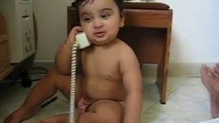 baby talks on the phone