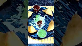 Dive into Flavor Paradise with Our Samosas , Paired with Vibrant Red and Green Chutney !!