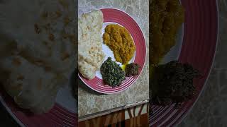 vegetarian Guyanese breakfast pumpkin /pakchoy/oil roti/paratha and mango achar