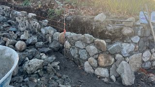 Reparando un muro de piedra. Quedó como nuevo