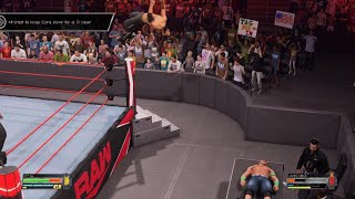 WWE 2K22 Cena goes through announce table