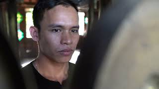 VIETNAM—A Xom plays the Bahnar gongs in the church, Kon K'tu.