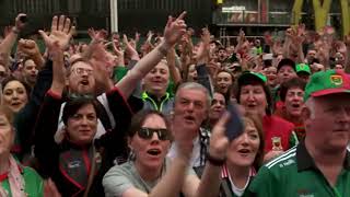 MAYO GAA FANS WITH MARTY MORRISSEY IN TIMES SQUARE NY CITY AFTER BEATING NEW YORK GAA