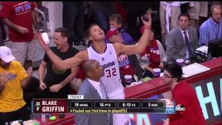 Blake Griffin inadvertently dumps water on a warriors fan G1 vs GSW 4-19-14