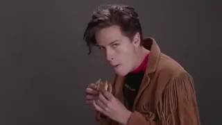 1 minute of Cole Sprouse eating a hamburger