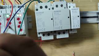 Automatic transfer switch for selection between 50A and 15A RV shore power