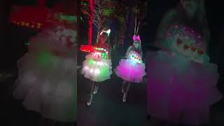 Beautiful girl in magic LED light up dress