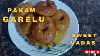 Juicy and tasty traditional Pakam Garelu recipe/Vadas in jaggery syrup/Bellam Garelu/festival recipe