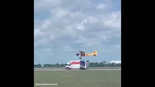 Plane lands on a moving car