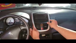 troca moldura painel peugeot 207 relógio para multimidia 2din.