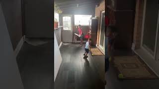 Two years old cricket player bowling