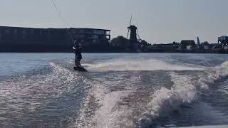 Tandem wakeboarding on a hot summerday